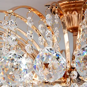 Потолочная люстра Eurosvet Ostiniya 3299/9 золото/прозрачный хрусталь Strotskis