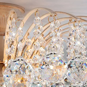 Потолочная люстра Eurosvet Ostiniya 3299/9 белый с золотом/прозрачный хрусталь Strotskis