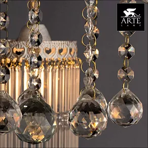 Потолочная люстра Arte Lamp Torrente A1678PL-7WG